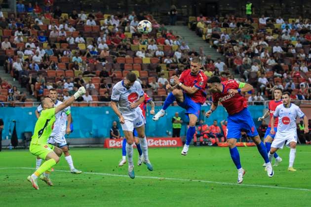 August 07, 2025, UEFA EUROPA LEAGUE, Third qualifying round 1st leg, FCSV (ROU) vs Drita (KOS), Bucharest, National Arena Stadium 8 Adrian Sut climbs high and wins a header but the goalkeeper saves