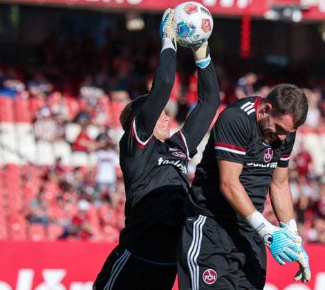 Jan Reichert 1 1FC Nuernberg and Christian Mathenia 26 1FC Nuernberg , right, during warm up, 1 FC Nuernberg vs SV Darmstadt 98, DFL, 2 Bundesliga, Saison 2025 2026, 2 Spieltag, Hinrunde, 08 08 2025 DFB regulations prohibit any use of photographs as image sequences and or quasi video Nuernberg Bayern Germany Copyright: xkolbert-press MartinxAgüerax