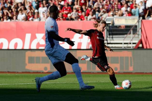 f l Patric Pfeiffer SV Darmstadt, 6 and Artem Stepanov 1 FC Nuernberg, 11 , 08 08 2025, Soccer, 2 Bundesliga, 1 FC Nuernberg SV Darmstadt 98, GER, Nuernberg, Max Morlock Stadion, DFL REGULATIONS PROHIBIT ANY USE OF PHOTOGRAPHS AS IMAGE SEQUENCES AND OR QUASI VIDEO Copyright: HMBxMedia xHeikoxBecker