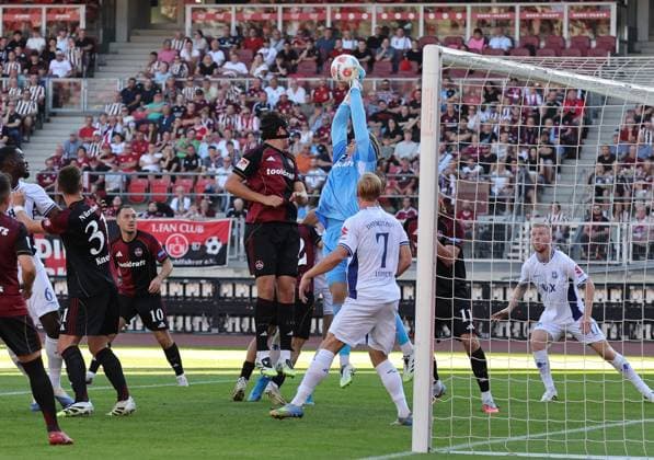 08 08 2025 Soccer Season 2025 2026 2 Soccer Bundesliga 02 Matchday 1 FC Nürnberg FCN Club SV Darmstadt 98 SVD Lilien Sportfoto Zink DaMa xdaxmax DFL regulations prohibit any use of photographs as image sequences and or quasi video only for editorial use Jan Reichert 1, 1 FC Nürnberg FCN faustet Ball weg