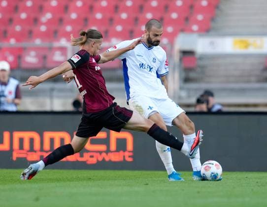 Artem Stepanov 1 FC Nuernberg, 11 vs Aleksandar Vukotic SV Darmstadt 98, 20 GER, 1 FC Nuernberg vs SV Darmstadt 98, Football, 2 Bundesliga, Matchday 2, Season 2025 2026, 08 08 2025 DFL REGULATIONS PROHIBIT ANY USE OF PHOTOGRAPHS AS IMAGE SEQUENCES AND OR QUASI VIDEO GER, 1 FC Nuernberg vs SV Darmstadt 98, Football, 2 Bundesliga, Matchday 2, Season 2025 2026, 08 08 2025 Nuernberg Copyright: xEibner-Pressefoto ScottxColemanx EP_SCN