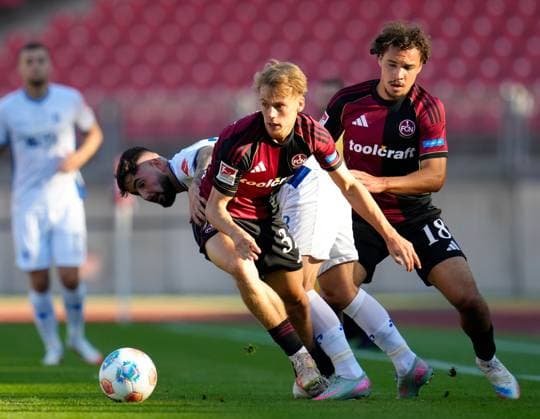 Tim Janisch 1 FC Nuernberg, 32 , Marco Richter SV Darmstadt 98, 23 and Rafael Lubach 1 FC Nuernberg, 18 GER, 1 FC Nuernberg vs SV Darmstadt 98, Football, 2 Bundesliga, Matchday 2, Season 2025 2026, 08 08 2025 DFL REGULATES PROHIBIT ANY USE OF PHOTOGRAPHS AS IMAGE SEQUENCES AND OR QUASI VIDEO GER, 1 FC Nuernberg vs SV Darmstadt 98, Football, 2 Bundesliga, Matchday 2, Season 2025 2026, 08 08 2025 Nuernberg Copyright: xEibner-Pressefoto ScottxColemanx EP_SCN