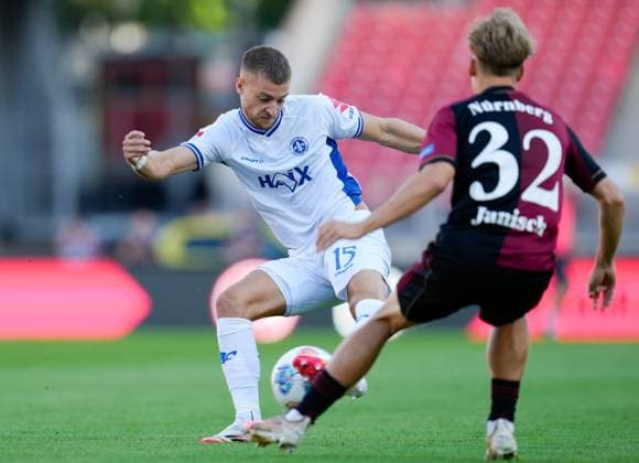 Fabian Nuernberger SV Darmstadt 98, 15 plays the ball GER, 1 FC Nuernberg vs SV Darmstadt 98, Football, 2 Bundesliga, Matchday 2, Season 2025 2026, 08 08 2025 DFL REGULATIONS PROHIBIT ANY USE OF PHOTOGRAPHS AS IMAGE SEQUENCES AND OR QUASI VIDEO GER, 1 FC Nuernberg vs SV Darmstadt 98, Football, 2 Bundesliga, Matchday 2, Season 2025 2026, 08 08 2025 Nuernberg Copyright: xEibner-Pressefoto ScottxColemanx EP_SCN