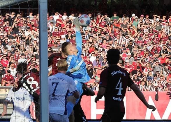 08 08 2025 Soccer Season 2025 2026 2 Soccer Bundesliga 02 Matchday 1 FC Nürnberg FCN Club SV Darmstadt 98 SVD Lilien Sportfoto Zink DaMa xdaxmax DFL regulations prohibit any use of photographs as image sequences and or quasi video only for editorial use Jan Reichert 1, 1 FC Nürnberg FCN clears by fist defense