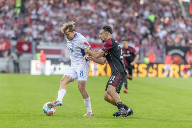 Nuremberg, Germany 08 August 2025 2 Liga 2025 2026 1 FC Nürnberg vs SV Darmstadt 98 In the picture from left in a duel Luca Marseiler Darmstadt and Luka Lochoshvili FCN DFL regulations prohibit any use of photographs as image sequences and or quasi video Copyright: xFotostandx xSchäferx