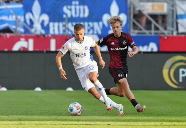08 08 2025 Soccer Season 2025 2026 2 Soccer Bundesliga 02 Matchday 1 FC Nürnberg FCN Club SV Darmstadt 98 SVD Lilien Sportfoto Zink DaMa xdaxmax DFL regulations prohibit any use of photographs as image sequences and or quasi video only for editorial use Fabian Nürnberger Nuernberger 15, SV Darmstadt 98 D98 SV98 Tim Janisch 32, 1 FC Nürnberg FCN