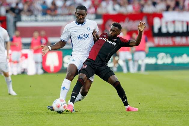 f l Patric Pfeiffer SV Darmstadt, 6 and Mickael Biron 1 FC Nuernberg, 7 , 08 08 2025, Soccer, 2 Bundesliga, 1 FC Nuernberg SV Darmstadt 98, GER, Nuernberg, Max Morlock Stadion, DFL REGULATIONS PROHIBIT ANY USE OF PHOTOGRAPHS AS IMAGE SEQUENCES AND OR QUASI VIDEO Copyright: HMBxMedia xHeikoxBecker