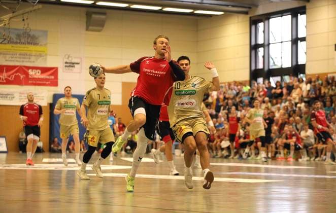 Photo Thomas Arnoldsen Aalborg against Renars Uscins right , Burgdorf Hannover Handball Men international, pre-season preparation at the Heide Cup in Schneverdingen on Fri 08 08 2025 TSV Hannover Burgdorf Aalborg BK