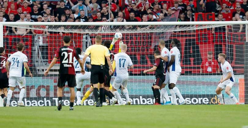 Robin Knoche 1 FC Nuernberg, 31 with a header from close range which is saved by goalkeeper Marcel Schuhen SV Darmstadt, 1 08 08 2025, Soccer, 2 Bundesliga, 1 FC Nuernberg SV Darmstadt 98, GER, Nuernberg, Max Morlock Stadion, DFL REGULATIONS PROHIBIT ANY USE OF PHOTOGRAPHS AS IMAGE SEQUENCES AND OR QUASI VIDEO Copyright: HMBxMedia xHeikoxBecker
