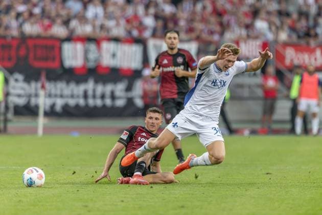 Nuremberg, Germany 08 August 2025 2 Liga 2025 2026 1 FC Nürnberg vs SV Darmstadt 98 In the picture from left in a duel Semir Telalovic FCN and Clemens Riedel Darmstadt DFL regulations prohibit any use of photographs as image sequences and or quasi video Copyright: xFotostandx xSchäferx
