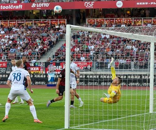Marcel Schuhen 1 SV Darmstadt 98 parries a ball on the line, Clemens Riedel 38 SV Darmstadt 98 looks on, 1 FC Nuernberg vs SV Darmstadt 98, DFL, 2 Bundesliga, Saison 2025 2026, 2 Spieltag, Hinrunde, 08 08 2025 DFB regulations prohibit any use of photographs as image sequences and or quasi video Nuernberg Bayern Germany Copyright: xkolbert-press MartinxAgüerax