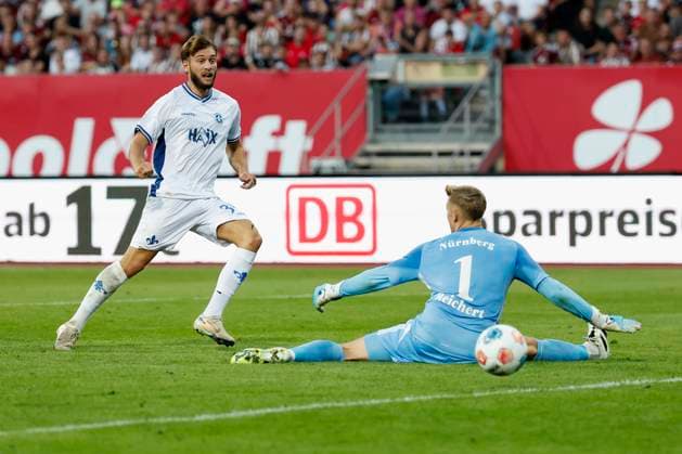 Killian Corredor SV Darmstadt, 34 Goal scored, scored the goal to 0 1, celebrate the goal, Goalkeeper Jan Reichert 1 FC Nuernberg, 1 is beaten 08 08 2025, Football, 2 Bundesliga, 1 FC Nuernberg SV Darmstadt 98, GER, Nuernberg, Max Morlock Stadion, DFL REGULATIONS PROHIBIT ANY USE OF PHOTOGRAPHS AS IMAGE SEQUENCES AND OR QUASI VIDEO Copyright: HMBxMedia xHeikoxBecker