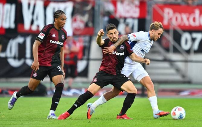 08 08 2025 Soccer Season 2025 2026 2 Soccer Bundesliga 02 Matchday 1 FC Nürnberg FCN Club SV Darmstadt 98 SVD Lilien Sportfoto Zink xwoxzix DFL regulations prohibit any use of photographs as image sequences and or quasi video only for editorial use Noah Maboulou 37, 1 FC Nürnberg FCN Danilo Soares 3, 1 FC Nürnberg FCN Luca Marseiler 8, SV Darmstadt 98 D98 SV98