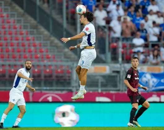 Fraser Hornby SV Darmstadt 98, 9 koepft den Ball GER, 1 FC Nuernberg vs SV Darmstadt 98, Football, 2 Bundesliga, Matchday 2, Season 2025 2026, 08 08 2025 DFL REGULATIONS PROHIBIT ANY USE OF PHOTOGRAPHS AS IMAGE SEQUENCES AND OR QUASI VIDEO GER, 1 FC Nuernberg vs SV Darmstadt 98, Football, 2 Bundesliga, Matchday 2, Season 2025 2026, 08 08 2025 Nuernberg Copyright: xEibner-Pressefoto ScottxColemanx EP_SCN