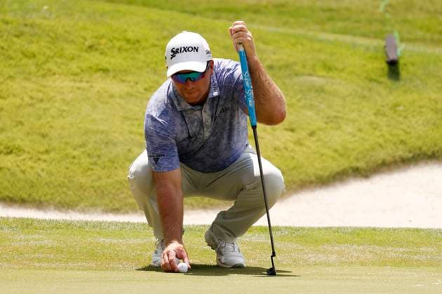 MEMPHIS, TN - AUGUST 08: Ryan Fox of New Zealand places his ball on the No. 4 green during the second round of the FedEx St. Jude Championship, August 8, 2025, at TPC Southward in Memphis, Tennessee. (Photo by Matthew Maxey Icon Sportswire) GOLF: AUG 08 PGA, Golf Herren FedEx Cup Playoffs - FedEx St. Jude Championship EDITORIAL USE ONLY Icon250808065