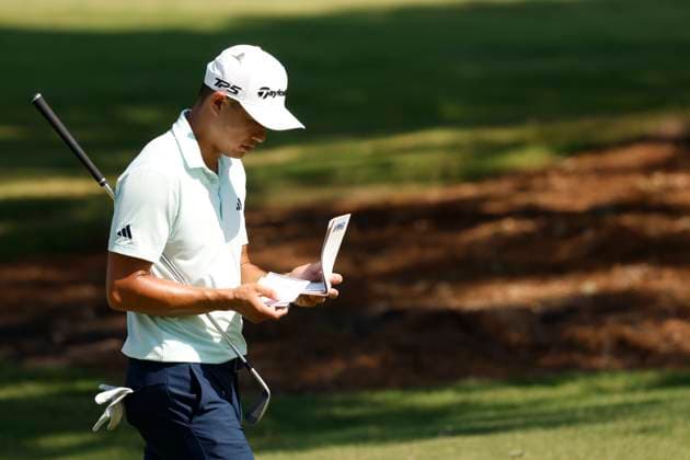 MEMPHIS, TN - AUGUST 08: Collin Morikawa of United States checks his yardage book and he walks down the No. 7 fairway during the second round of the FedEx St. Jude Championship, August 8, 2025, at TPC Southward in Memphis, Tennessee. (Photo by Matthew Maxey Icon Sportswire) GOLF: AUG 08 PGA, Golf Herren FedEx Cup Playoffs - FedEx St. Jude Championship EDITORIAL USE ONLY Icon250808019