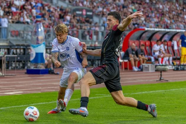 Nuremberg, Germany 08 August 2025 2 Liga 2025 2026 1 FC Nürnberg vs SV Darmstadt 98 In the picture from left in a duel Luca Marseiler Darmstadt and Luka Lochoshvili FCN DFL regulations prohibit any use of photographs as image sequences and or quasi video Copyright: xFotostandx xSchäferx