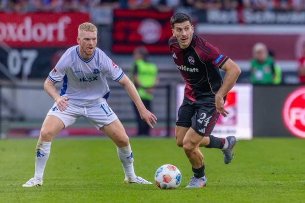 Nuremberg, Germany 08 August 2025 2 Liga 2025 2026 1 FC Nürnberg vs SV Darmstadt 98 In the picture from left in a duel Kai Klefisch Darmstadt and Luka Lochoshvili FCN DFL regulations prohibit any use of photographs as image sequences and or quasi video Copyright: xFotostandx xSchäferx
