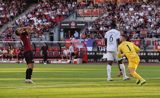 08 08 2025 Soccer Season 2025 2026 2 Soccer Bundesliga 02 Matchday 1 FC Nürnberg FCN Club SV Darmstadt 98 SVD Lilien Sportfoto Zink DaMa xdaxmax DFL regulations prohibit any use of photographs as image sequences and or quasi video only for editorial use Marcel Schuhen 1, SV Darmstadt 98 D98 SV98 holds ball Julian Justvan 10, 1 FC Nürnberg FCN disappointed disappointment