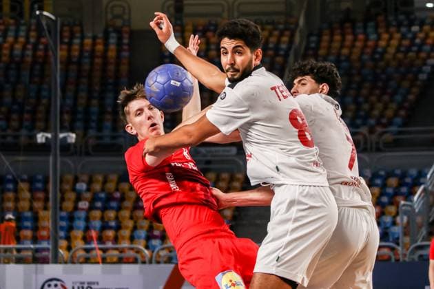 August 9, 2025, Cairo, Cairo, Egypt: DARLING SORENSEN The Denmark Player and TEBER MAHDI The Tunisia Player During IHF Men s World Championship, WM, Weltmeisterschaft u19 Match Between Denmark and Tunisia At Cairo Stadium Main Hall Cairo Egypt - ZUMAe138 20250809_zsp_e138_006 Copyright: xBassemxElziatyx
