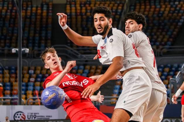 August 9, 2025, Cairo, Cairo, Egypt: DARLING SORENSEN The Denmark Player and TEBER MAHDI The Tunisia Player During IHF Men s World Championship, WM, Weltmeisterschaft u19 Match Between Denmark and Tunisia At Cairo Stadium Main Hall Cairo Egypt - ZUMAe138 20250809_zsp_e138_007 Copyright: xBassemxElziatyx