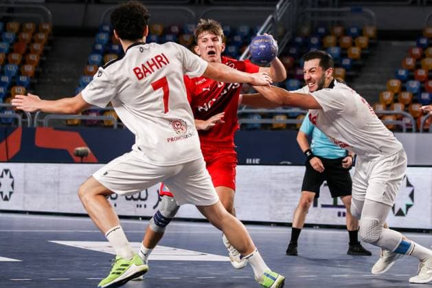 August 9, 2025, Cairo, Cairo, Egypt: DARLING SORENSEN The Denmark Player and TEBER MAHDI The Tunisia Player During IHF Men s World Championship, WM, Weltmeisterschaft u19 Match Between Denmark and Tunisia At Cairo Stadium Main Hall Cairo Egypt - ZUMAe138 20250809_zsp_e138_012 Copyright: xBassemxElziatyx