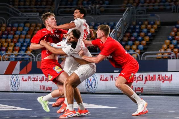 August 9, 2025, Cairo, Cairo, Egypt: KJARGAARD KASPER The Denmark Player ZARDOUM MOHAMMED, And BEN FREDJ MOHAMMED The Tunisia Players During IHF Men s World Championship, WM, Weltmeisterschaft u19 Match Between Denmark and Tunisia At Cairo Stadium Main Hall Cairo Egypt - ZUMAe138 20250809_zsp_e138_018 Copyright: xBassemxElziatyx