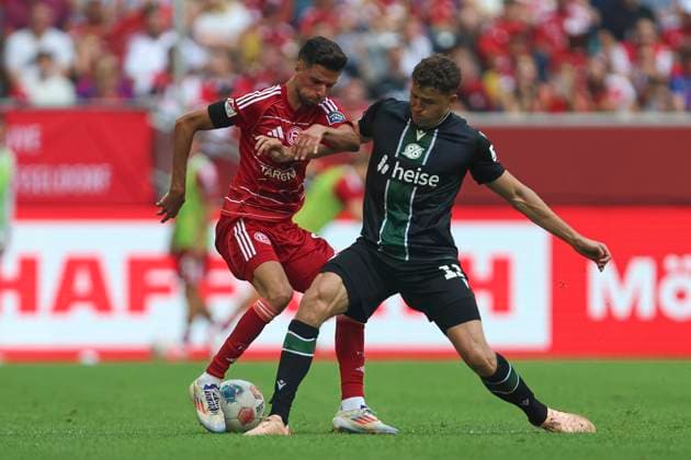 Anouar El Azzouzi Fortuna Duesseldorf and Benedikt Pichler Hannover 96 in a duel during the 2 Bundesliga match between Fortuna Dusseldorf and Hannover 96, Merkur Spiel Arena on August 09, 2025 in Gelsenkirchen, Germany, Germany Photo by Oliver Kaelke DeFodi Images Anouar El Azzouzi Fortuna Duesseldorf and Benedikt Pichler Hannover 96 battle for the ball during the 2 Bundesliga match between Fortuna Duesseldorf and Hannover 96 at Merkur Spiel Arena on August 9, 2025 in Gelsenkirchen, Germany Photo by Oliver Kaelke DeFodi Images DFB DFL REGULATIONS PROHIBIT ANY USE OF PHOTOGRAPHS AS IMAGE SEQUENCES AND OR QUASI VIDEO Photo by Oliver Kaelke DeFodi Images