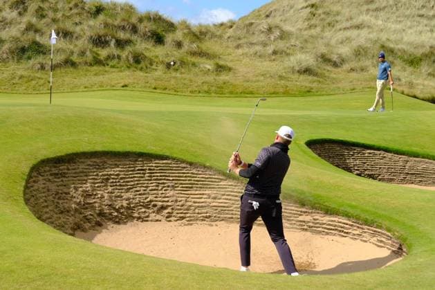 UK: Nexo Championship, Old Course at Trump International Golf Links, Aberdeen, Scotland on 09 August 2025: Pictured: Tadeas Tetak (Slovakia) hits out of a bunker on the 16th green during the third round of the Nexo Championship 2025 at Trump International Golf Links, Aberdeenshire, Scotland Aberdeen Trump International Golf Links Scotland Copyright: xAlexxToddx