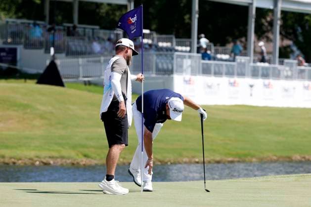 MEMPHIS, TN - AUGUST 09: Shane Lowry of Ireland gets his ball from the hole after chipping in on No. 11 during the third round of the FedEx St. Jude Championship, August 9, 2025, at TPC Southward in Memphis, Tennessee. (Photo by Matthew Maxey Icon Sportswire) GOLF: AUG 09 PGA, Golf Herren FedEx Cup Playoffs - FedEx St. Jude Championship EDITORIAL USE ONLY Icon250809010