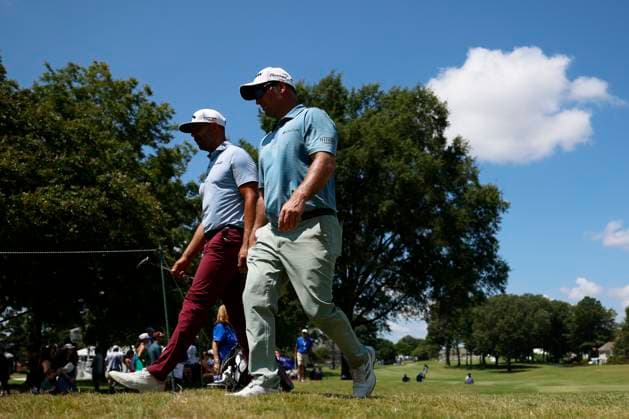 MEMPHIS, TN - AUGUST 09: Erik van Rooyen of South Africa and Ryan Fox of New Zealand walk off the No. 10 green during the third round of the FedEx St. Jude Championship, August 9, 2025, at TPC Southward in Memphis, Tennessee. (Photo by Matthew Maxey Icon Sportswire) GOLF: AUG 09 PGA, Golf Herren FedEx Cup Playoffs - FedEx St. Jude Championship EDITORIAL USE ONLY Icon250809020