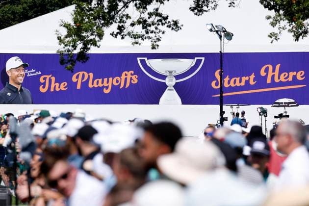 MEMPHIS, TN - AUGUST 09: Fans line the back of the driving range in front of a ÒThe Playoffs Start HereÓ sign during the third round of the FedEx St. Jude Championship, August 9, 2025, at TPC Southward in Memphis, Tennessee. (Photo by Matthew Maxey Icon Sportswire) GOLF: AUG 09 PGA, Golf Herren FedEx Cup Playoffs - FedEx St. Jude Championship EDITORIAL USE ONLY Icon250809001