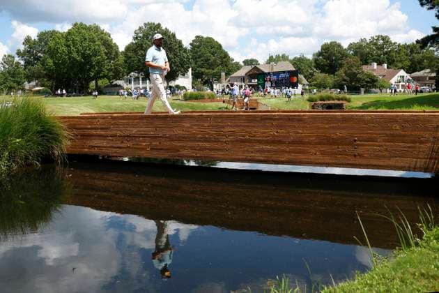 MEMPHIS, TN - AUGUST 09: Andrew Novak of the United States walks across the bridge behind No. 11 during the third round of the FedEx St. Jude Championship, August 9, 2025, at TPC Southward in Memphis, Tennessee. (Photo by Matthew Maxey Icon Sportswire) GOLF: AUG 09 PGA, Golf Herren FedEx Cup Playoffs - FedEx St. Jude Championship EDITORIAL USE ONLY Icon250809052