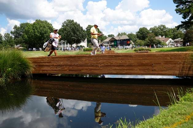 MEMPHIS, TN - AUGUST 09: Kurt Kitayama of the United States walks across the bridge behind No. 11 during the third round of the FedEx St. Jude Championship, August 9, 2025, at TPC Southward in Memphis, Tennessee. (Photo by Matthew Maxey Icon Sportswire) GOLF: AUG 09 PGA, Golf Herren FedEx Cup Playoffs - FedEx St. Jude Championship EDITORIAL USE ONLY Icon250809054