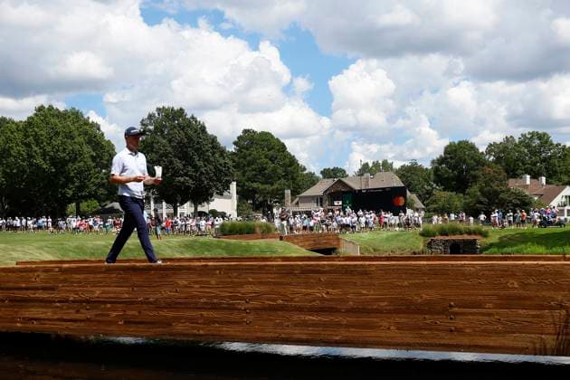MEMPHIS, TN - AUGUST 09: Justin Rose of England walks across the bridge behind No. 11 during the third round of the FedEx St. Jude Championship, August 9, 2025, at TPC Southward in Memphis, Tennessee. (Photo by Matthew Maxey Icon Sportswire) GOLF: AUG 09 PGA, Golf Herren FedEx Cup Playoffs - FedEx St. Jude Championship EDITORIAL USE ONLY Icon250809058