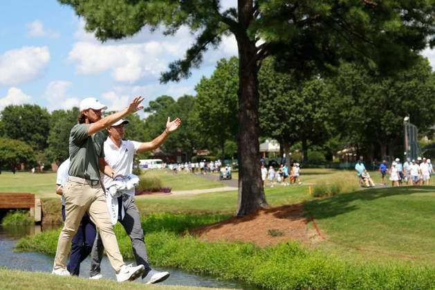 MEMPHIS, TN - AUGUST 09: Tommy Fleetwood of England and Collin Morikawa of the United States point as they walk and talk coming off the No. 12 tee box during the third round of the FedEx St. Jude Championship, August 9, 2025, at TPC Southward in Memphis, Tennessee. (Photo by Matthew Maxey Icon Sportswire) GOLF: AUG 09 PGA, Golf Herren FedEx Cup Playoffs - FedEx St. Jude Championship EDITORIAL USE ONLY Icon250809063