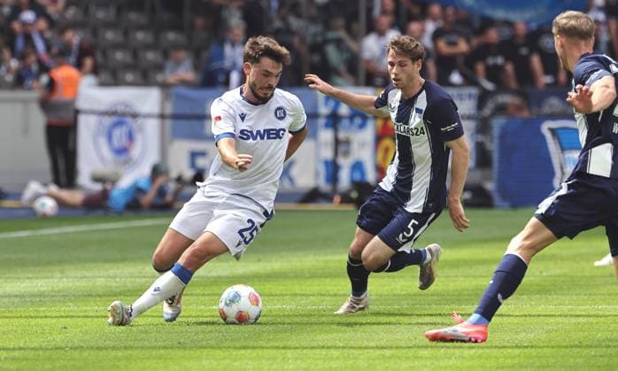 Lilian Egloff on the ball, Leon Jensen duel Match scene Action Sport Football Soccer DFL 2 Bundesliga Men 2 Matchday Season 2025 2026 10 08 2025 Hertha BSC Berlin vs Karlsruher SC KSC DFL regulations prohibit any use of photographs as image sequences and or quasi video