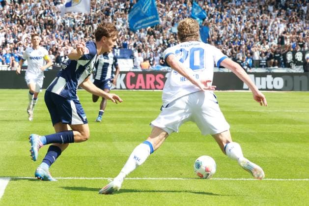 DEU, DFL, 2 FBL, Hertha BSC vs Karlsruher SC, 10 08 2025, Berliner Olympiastadion, Berlin, DEU, DFL, 2 FBL, Hertha BSC vs Karlsruher SC, im Bild Maurice Krattenmacher Hertha BSC Berlin 14 , David Herold Karlsruher SC 20 DFL regulations prohibit any use of Photographs as image sequences and or quasi video nordphotoxGmbHx xEngler nph00076