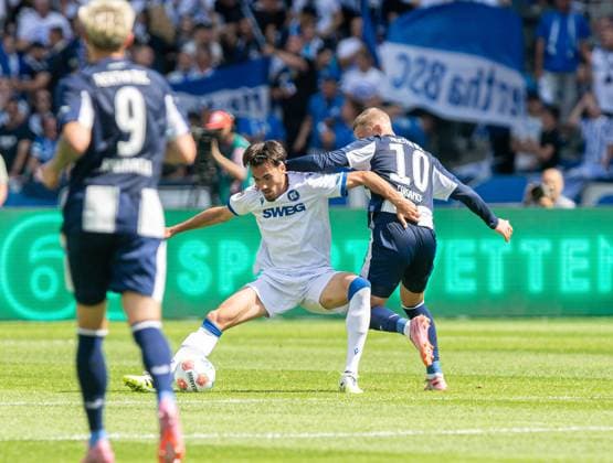 Soccer, Men, Season 2025 2026, 2 Bundesliga 2 Matchday , Hertha BSC Karlsruher SC, v l Dawid Kownacki Hertha BSC , Roko Simic Karlsruher SC , Michael Cuisance Hertha BSC , 10 08 2025, Copyright: xSebastianxRäppold MatthiasxKochx