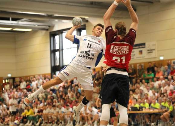 Photo Goal throw from Nicolaj Jorgensen HSV against Lukas Nilsson Aalborg Handball Men international, pre-season preparation at the Heide Cup in Schneverdingen on Sun 10 08 2025 Final match final HSV Handball Aalborg HB