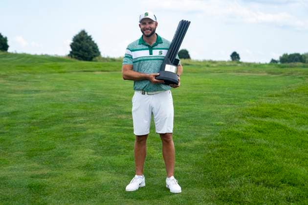 BOLINGBROOK, IL - AUGUST 10: LIV Golf Chicago individual champion Dean Burmester poses with the individual championship trophy after the final round of LIV Golf Chicago on Sunday, August 10, 2025 at Bolingbrook Golf Club in Bolingbrook, IL (Photo by Ben Hsu Icon Sportswire) GOLF: AUG 10 LIV Golf Chicago EDITORIAL USE ONLY Icon224250810004