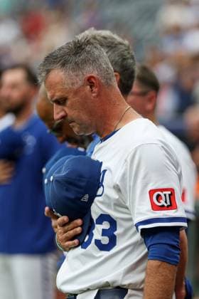 August 11, 2025: Kansas City Royals manager Matt Quatraro (33) stands during the National Anthem before a game against the Washington Nationals at Kauffman Stadium in Kansas City, MO. CSM Kansas City United States of America - ZUMAc04_ 20250811_zma_c04_005 Copyright: xDavidxSmithx