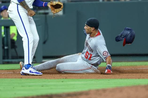 August 11, 2025: Washington Nationals right fielder Daylen Lile (51) slides into third base safe during the sixth inning against the Kansas City Royals at Kauffman Stadium in Kansas City, MO. CSM Kansas City United States of America - ZUMAc04_ 20250811_zma_c04_023 Copyright: xDavidxSmithx