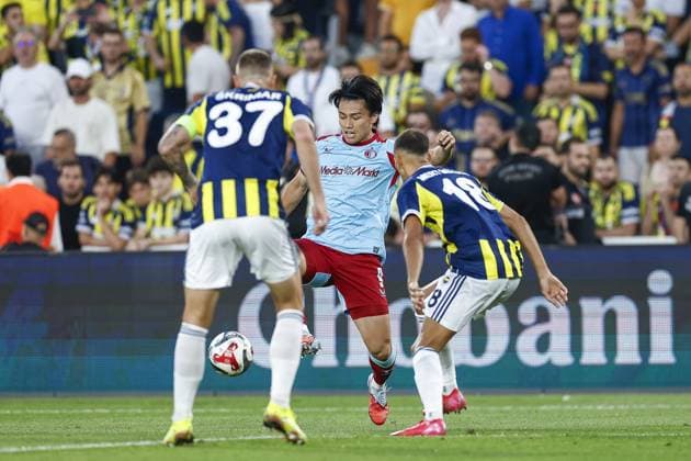 ISTANBUL , 12-08-2025 , Sukru Saracoglu stadium , season 2025 2026 , UEFA Champions League , 3th qualifying round, 2nd leg between Fenerbahce and Feyenoord , picture shows.Fenerbahce player Milan Skriniar Feyenoord player Ayase Ueda Fenerbahce player Mert Muldur Fenerbahce - Feyenoord  x30479130x Copyright:
