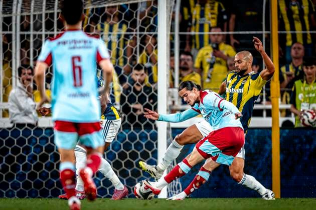 Feyenoord Rotterdam forwarder Anis Hadj Moussa, Fenerbahce SK midfielder Sofyan Amrabat during the match Fenerbahce Feyenoord at the Åžükrü SaracoÄülu Spor Kompleksi for the Champions League Third qualifying round 2nd leg season 2025 2026 in ISTANBUL, Turkey on 10 august 2025, photo by Marcel van Dorst EYE4images DeFodi Images