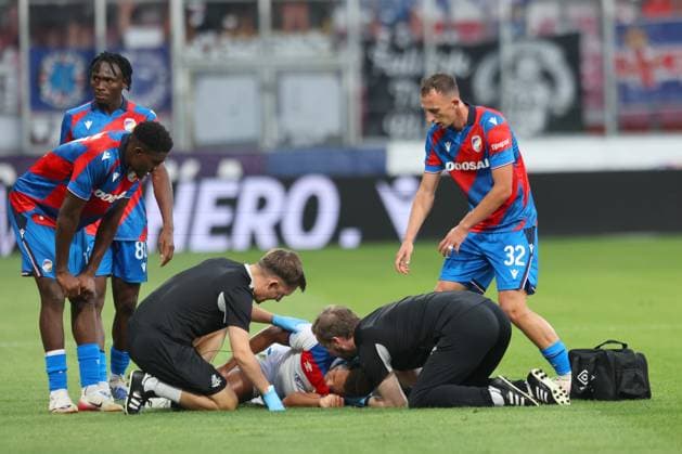 Cyriel Dessers of Rangers gets treatment for an injury during the UEFA Champions League Third Round qualifying second leg at the Doosan Arena, Plzen. Viktoria Plzen v Rangers, UEFA Champions League, 3rd Qualifying Round, Second Leg, Football, Doosan Arena, Plzen, Czech Republic, UK - 12 Aug 2025Plzen Doosan Arena Czech Republic EDITORIAL USE ONLY No use with unauthorised audio, video, data, fixture lists, club league logos or live services. Online in-match use limited to 120 images, no video emulation. No use in betting, games or single club league player publications. Copyright: xRangersxFC Shutterstockx 15438242cw
