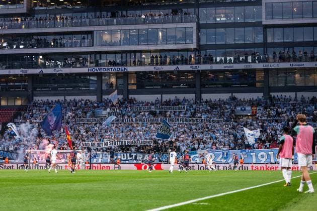 250812 Fans of Malmö FF with a banner during the UEFA Champions League qualifier football match between FC Copenhagen and Malmö FF on August 12, 2025 in Copenhagen Photo Petter Arvidson BILDBYRAN kod PA PA1061 fotboll football soccer fotball uefa champions league champions league fc copenhagen malmö ff bbeng kval fc köpenhamn publik  Copyright: PETTERxARVIDSON BB250812PA080