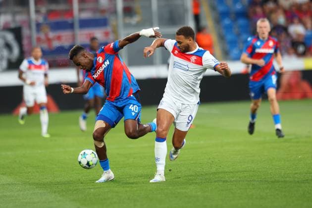Sampson Dweh of FC Viktoria Plzen and Cyriel Dessers of Rangers during the UEFA Champions League Third Round qualifying second leg at the Doosan Arena, Plzen. Viktoria Plzen v Rangers, UEFA Champions League, 3rd Qualifying Round, Second Leg, Football, Doosan Arena, Plzen, Czech Republic, UK - 12 Aug 2025Plzen Doosan Arena Czech Republic EDITORIAL USE ONLY No use with unauthorised audio, video, data, fixture lists, club league logos or live services. Online in-match use limited to 120 images, no video emulation. No use in betting, games or single club league player publications. Copyright: xRangersxFC Shutterstockx 15438242dx