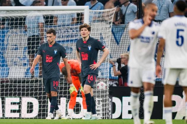 250812 Colin Rösler and Oliver Berg of Malmö FF looks dejected after 4 0 during the UEFA Champions League qualifier football match between FC Copenhagen and Malmö FF on August 12, 2025 in Copenhagen Photo Petter Arvidson BILDBYRAN kod PA PA1061 fotboll football soccer fotball uefa champions league champions league fc copenhagen malmö ff bbeng kval fc köpenhamn depp  Copyright: PETTERxARVIDSON BB250812PA097