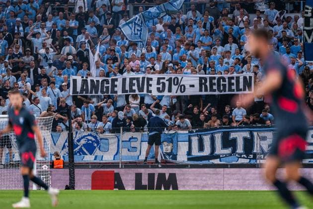 250812 Fans of Malmö FF with a banner during the UEFA Champions League qualifier football match between FC Copenhagen and Malmö FF on August 12, 2025 in Copenhagen Photo Petter Arvidson BILDBYRAN kod PA PA1061 fotboll football soccer fotball uefa champions league champions league fc copenhagen malmö ff bbeng kval fc köpenhamn bbauto publik  Copyright: PETTERxARVIDSON BB250812PA109